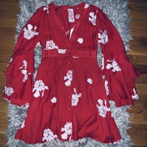 Beautiful red dress with embroidered white detail